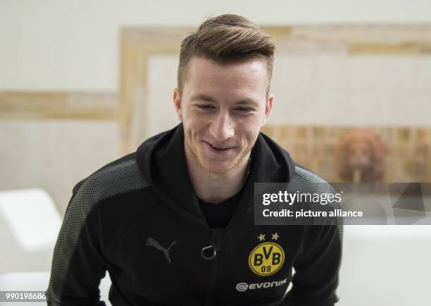 Borussia Dortmund's Marco Reus speaking to the press at a press conference during the club's winter training in Marbella, Spain, 07 January 2018....