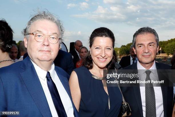 Dominique Besnehard, Agnes Buzyn and Yves Levy attend Line Renaud's 90th Anniversary on July 2, 2018 in Paris, France.