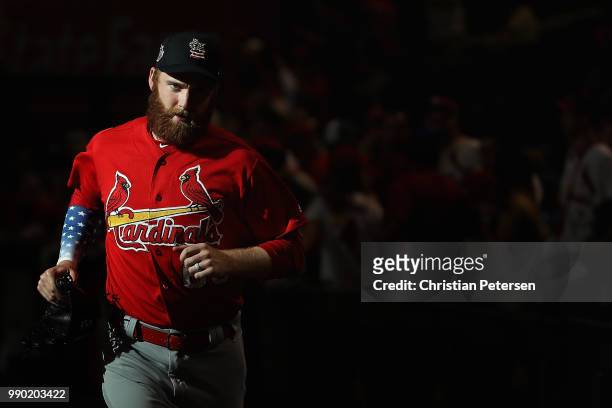 Pitcher John Brebbia of the St. Louis Cardinals runs off the field following warm-ups to the MLB game against the Arizona Diamondbacks at Chase Field...