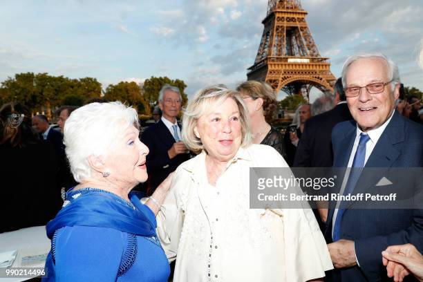 Line Renaud, Maryvonne Pinault and Baron David de Rothschild attend Line Renaud's 90th Anniversary on July 2, 2018 in Paris, France.