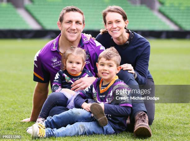 Melbourne Storm veteran Ryan Hoffman poses with wife Melissa and his children Mia and Zach during a press conference to announcement his retirement...