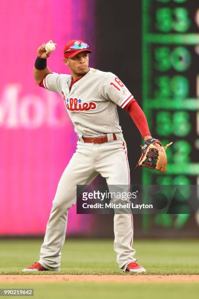 Cesar Hernandez of the Philadelphia Phillies fields a ground ball during a baseball game against the Washington Nationals at Nationals Park on June...