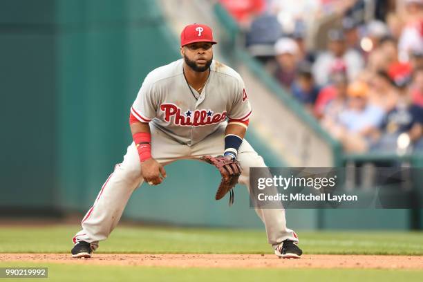 Carlos Santana of the Philadelphia Phillies in position during a baseball game against the Washington Nationals at Nationals Park on June 23, 2018 in...