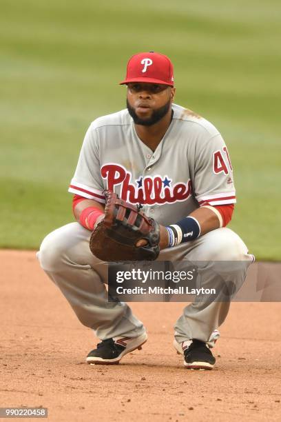 Carlos Santana of the Philadelphia Phillies looks on during a baseball game against the Washington Nationals at Nationals Park on June 23, 2018 in...