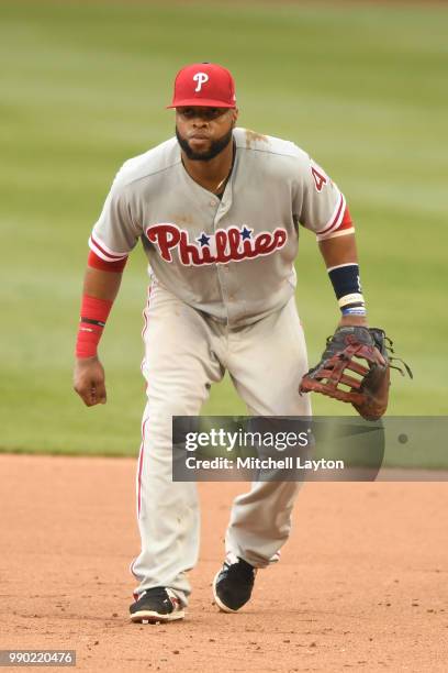 Carlos Santana of the Philadelphia Phillies in position during a baseball game against the Washington Nationals at Nationals Park on June 23, 2018 in...