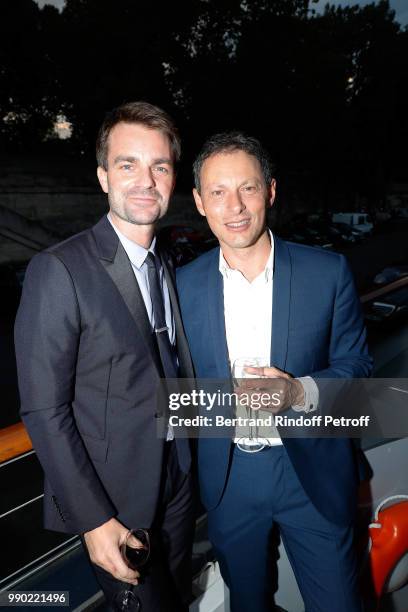 Bruno Julliard and Marc Olivier Fogiel attend Line Renaud's 90th Anniversary on July 2, 2018 in Paris, France.