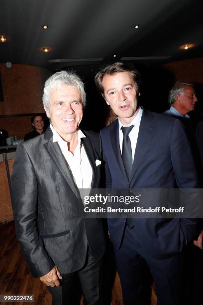 Claude Serillon and Francois Baroin attend Line Renaud's 90th Anniversary on July 2, 2018 in Paris, France.