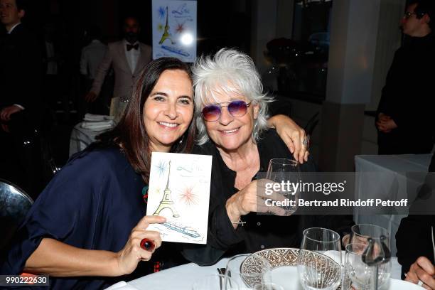 Nathalie Garcon and Catherine Lara attend Line Renaud's 90th Anniversary on July 2, 2018 in Paris, France.