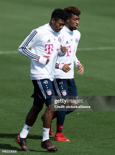 Bayern Munich's David Alaba and Kingsley Coman participate in the training session in Doha, Qatar, 07 January 2017. The FC Bayern Munich squad is...