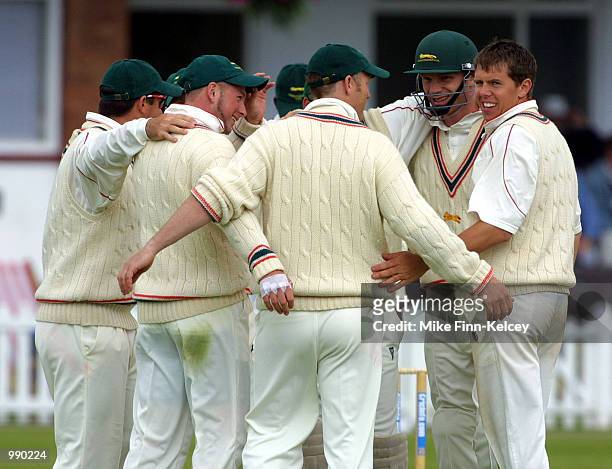 Carl Crowe of Leicestershire celebrates with team-mates after dismissing Michael Burns of Somerset for 60 in the CricInfo County Championship match...