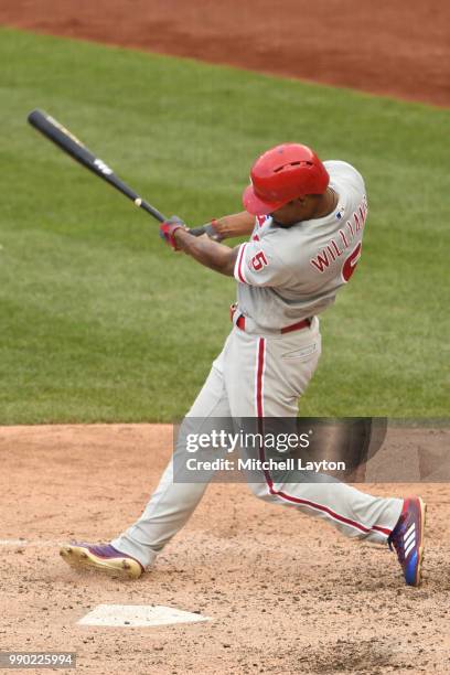 Nick Williams of the Philadelphia Phillies takes a swing during a baseball game against the Washington Nationals at Nationals Park on June 23, 2018...