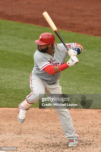 Carlos Santana of the Philadelphia Phillies prepares for a pitch during a baseball game against the Washington Nationals at Nationals Park on June...