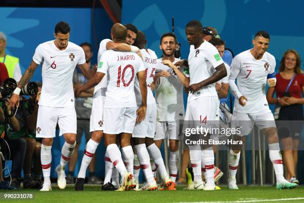 Pepe of Portugal celebrates scoring his side's first goal during the 2018 FIFA World Cup Russia Round of 16 match between Uruguay and Portugal at...