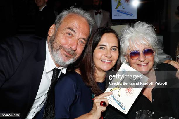 Jean-Marie Duprez; Nathalie Garcon and Catherine Lara attend Line Renaud's 90th Anniversary on July 2, 2018 in Paris, France.