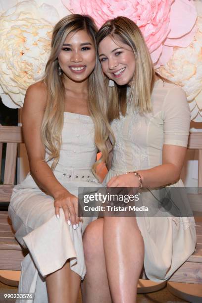 Diana zur Loewen and Kisu attend the 'Lvly' care series launch by Paola Maria and DM Drugstore at Invalidenstrasse on July 2, 2018 in Berlin, Germany.