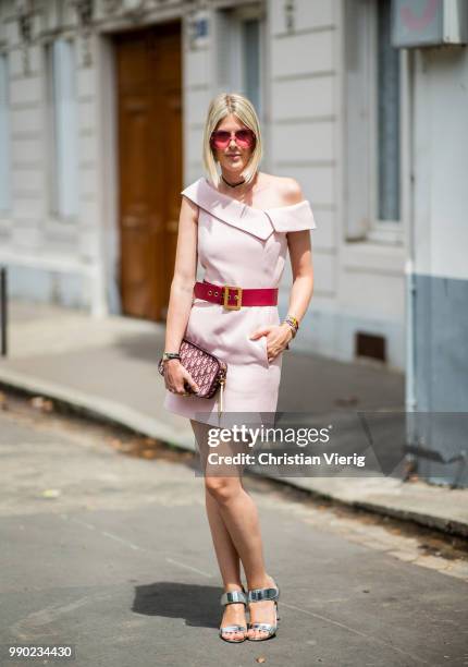 Sofie Valkiers wearing dress with belt is seen outside Dior on day two during Paris Fashion Week Haute Couture FW18 on July 2, 2018 in Paris, France.