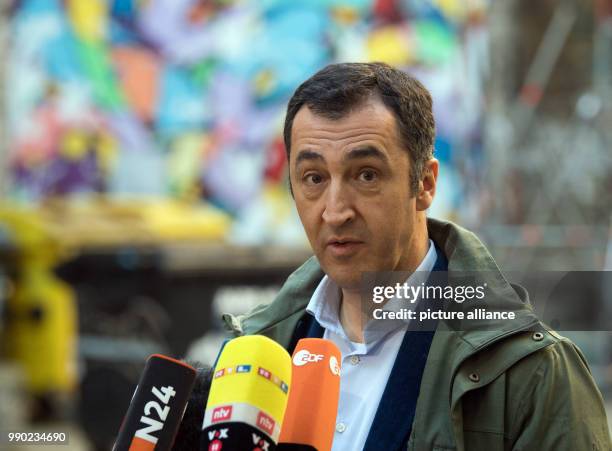 The chairman of German party Alliance 90/The Greens, Cem Ozdemir, arrives at the board meeting of his party in the Vierten Hinterhof of the Fabrik 23...