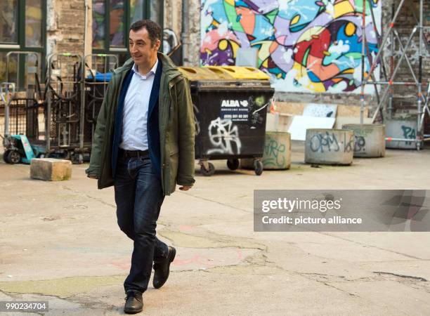 The chairman of German party Alliance 90/The Greens, Cem Ozdemir, arrives at the board meeting of his party in the Vierten Hinterhof of the Fabrik 23...