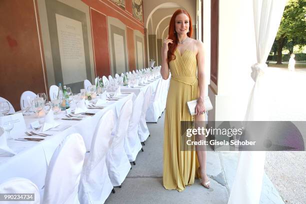 Barbara Meier wearing jewelry by Thomas Jirgens, Juwelenschmiede, during the Juwelendinner to celebrate the 25th anniversary of Juwelenschmiede and...