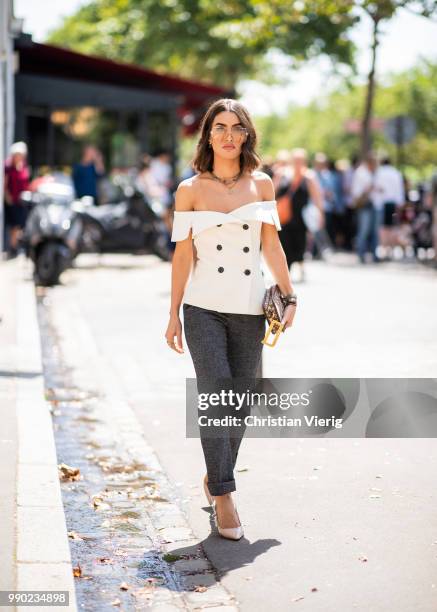 Camila Coelho is seen outside Dior on day two during Paris Fashion Week Haute Couture FW18 on July 2, 2018 in Paris, France.