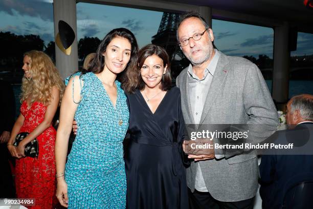 Zofia Reno, Anne Hidalgo and Jean Reno attend Line Renaud's 90th Anniversary on July 2, 2018 in Paris, France.