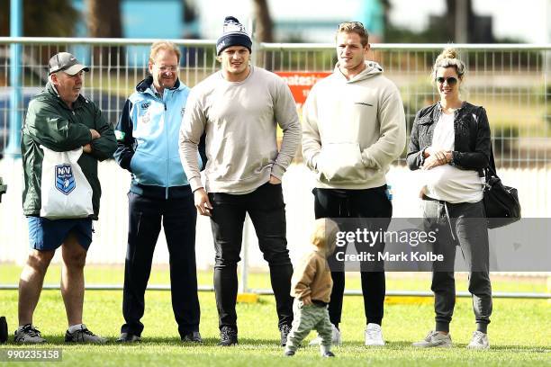 George Burgess and Tom Burgess watch on during a New South Wales Blues State of Origin media session at Coogee Oval on July 3, 2018 in Sydney,...