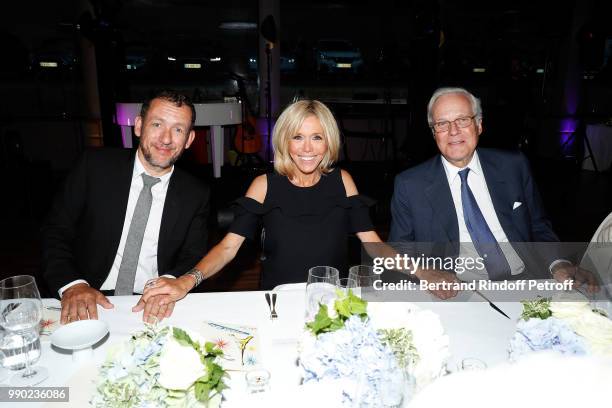 Dany Boon, Brigitte Macron and David de Rothschild attend Line Renaud's 90th Anniversary on July 2, 2018 in Paris, France.