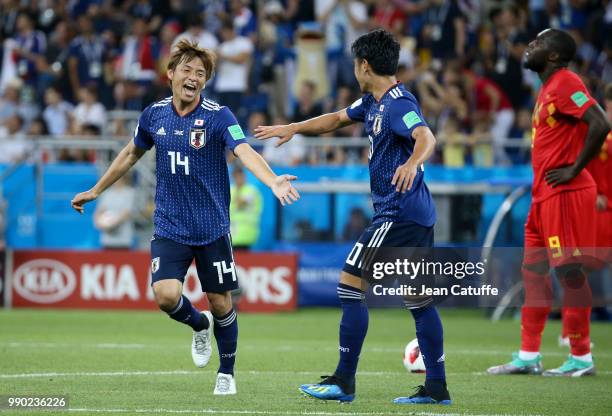 Takashi Inui of Japan celebrates his goal with Shinji Kagawa during the 2018 FIFA World Cup Russia Round of 16 match between Belgium and Japan at...