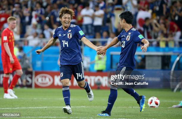 Takashi Inui of Japan celebrates his goal with Shinji Kagawa during the 2018 FIFA World Cup Russia Round of 16 match between Belgium and Japan at...