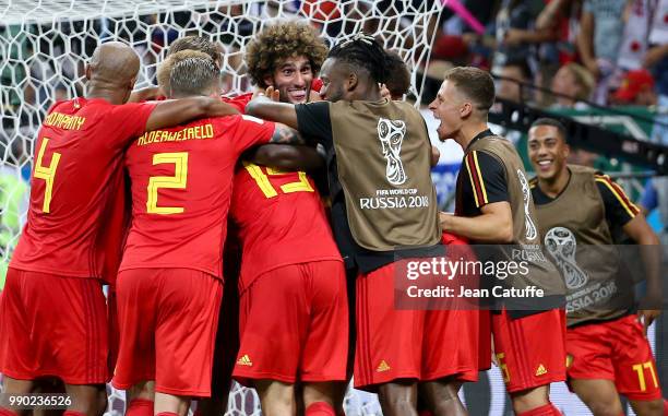 Nacer Chadli of Belgium celebrates his last minute winning goal with Marouane Fellaini, Youri Tielemans and teammates during the 2018 FIFA World Cup...