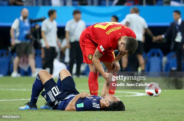 Eden Hazard of Belgium greets Shinji Kagawa of Japan following the 2018 FIFA World Cup Russia Round of 16 match between Belgium and Japan at Rostov...