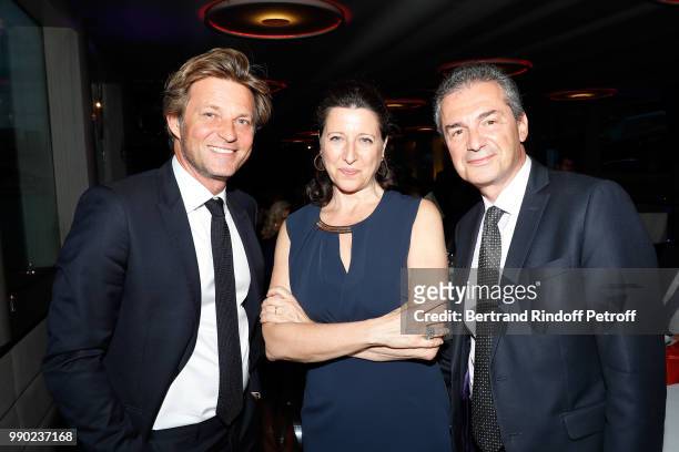 Laurent Delahousse, Agnes Buzyn and Yves Levy attend Line Renaud's 90th Anniversary on July 2, 2018 in Paris, France.