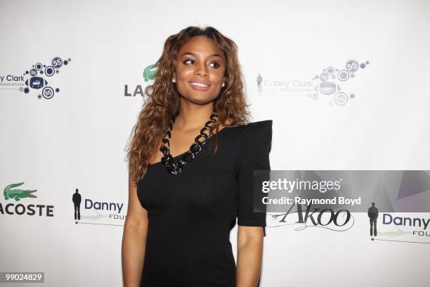 Actress and television host Alesha Renee poses for photos during "Le Moulin Rouge, A Night In Paris" Black-Tie Gala at the Alhambra Palace Restaurant...