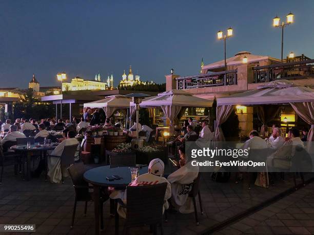 Restaurants, bars and nightlife in the old city near Kazan Kremlin and The Kul Sharif Mosque and river Reka Kazanka, an arm of the Volga on June 29,...
