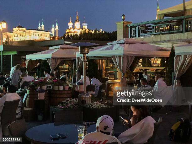 Restaurants, bars and nightlife in the old city near Kazan Kremlin and The Kul Sharif Mosque and river Reka Kazanka, an arm of the Volga on June 29,...