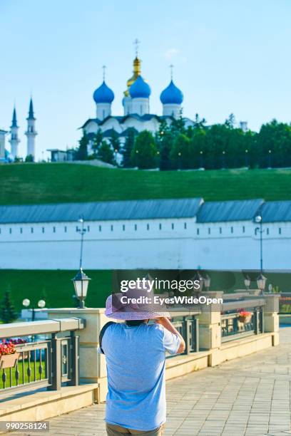 Cityview in the old town with view on Kazan Kremlin with Kul Sharif Mosque on June 29, 2018 in Kazan, Tatarstan, Russia.