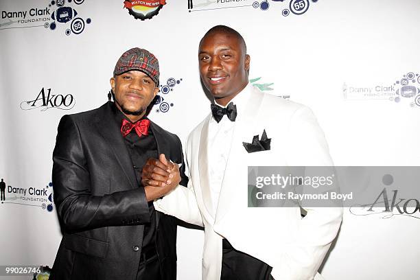 Actor Hosea Chanchez and New York Giants football player Danny Clark poses for photos during "Le Moulin Rouge, A Night In Paris" Black-Tie Gala at...