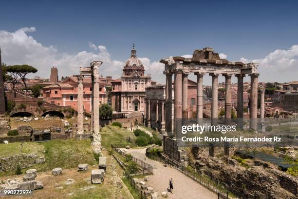 roman forum. temple of saturn in the foreground, rome italy. - rz stock pictures, royalty-free photos & images