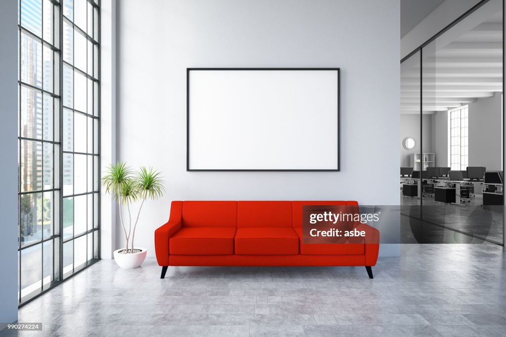 Waiting Room with Empty Frame and Red Sofa