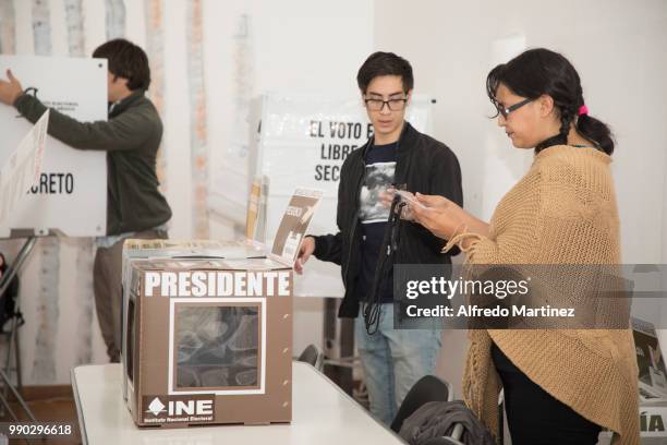 Poll workers get ready to prepare the vote polling station located inside Museo Casa Leon Trotsky during the 2018 Presidential Elections in Mexico on...