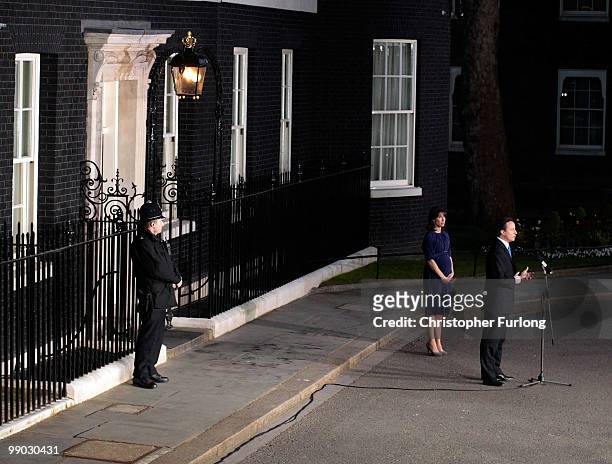 Conservative leader David Cameron and his wife Samantha arrive in Downing St as the new UK Prime Minister on May 11, 2010 in London, England. After...