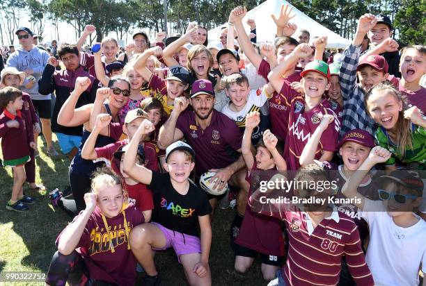 Ben Hunt poses for a photo with fans during a Queensland Maroons Fan Day on July 3, 2018 in Hervey Bay, Australia.