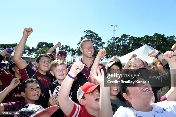 Daly Cherry-Evans with young fans during a Queensland Maroons Fan Day on July 3, 2018 in Hervey Bay, Australia.