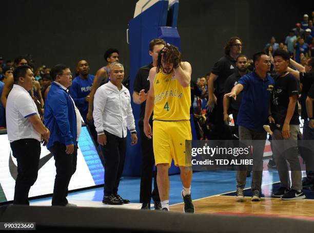 In this photo taken July 2 Australian player Christopher Goulding reacts after a brawl with Philippine players during their FIBA World Cup Asian...