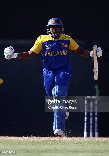 Chamara Kapugedera of Sri Lanka celebrates after hitting the winning runs during the ICC World Twenty20 Super Eight match between India and Sri Lanka...