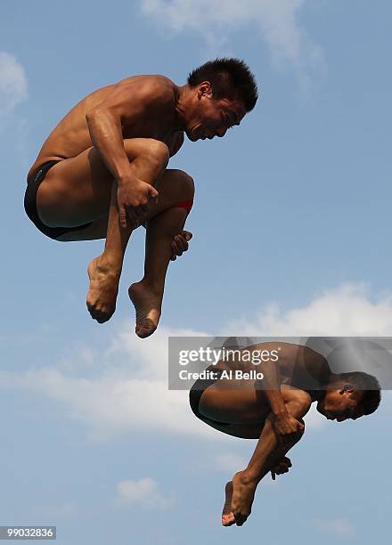 Julian Sanchez and Alejandro Arroyo of Mexico dive during the Men's Synchronized 3 Meter Springboard Final at the Fort Lauderdale Aquatic Center...