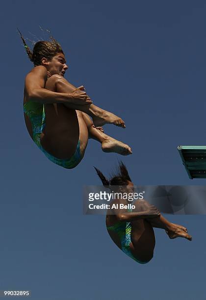 Juliana Veloso and Tammy Takagi of Brazil dive during the Women's Synchronized 3 Meter Final at the Fort Lauderdale Aquatic Center during Day 4 of...
