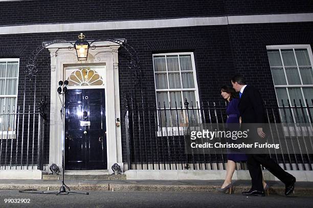 Conservative leader David Cameron and his wife Samantha arrive in Downing St as the new British Prime Minister on May 11, 2010 in London, England....