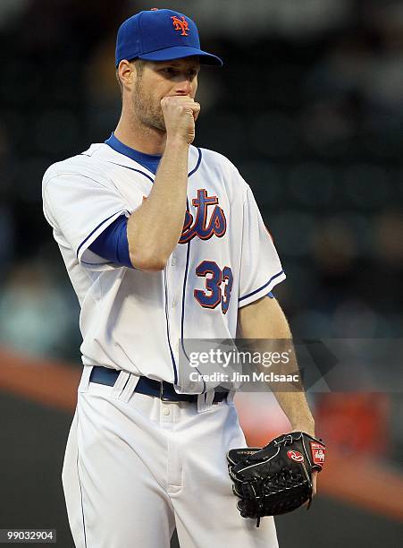 John Maine of the New York Mets delivers a pitch against the Washington Nationals on May 10, 2010 at Citi Field in the Flushing neighborhood of the...