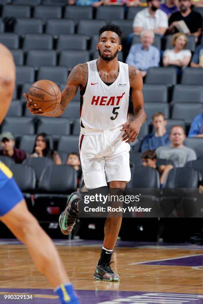 Derrick Jones Jr. #5 of the Miami Heat handles the ball against the Golden State Warriors during the 2018 California Classic on July 2, 2018 at...
